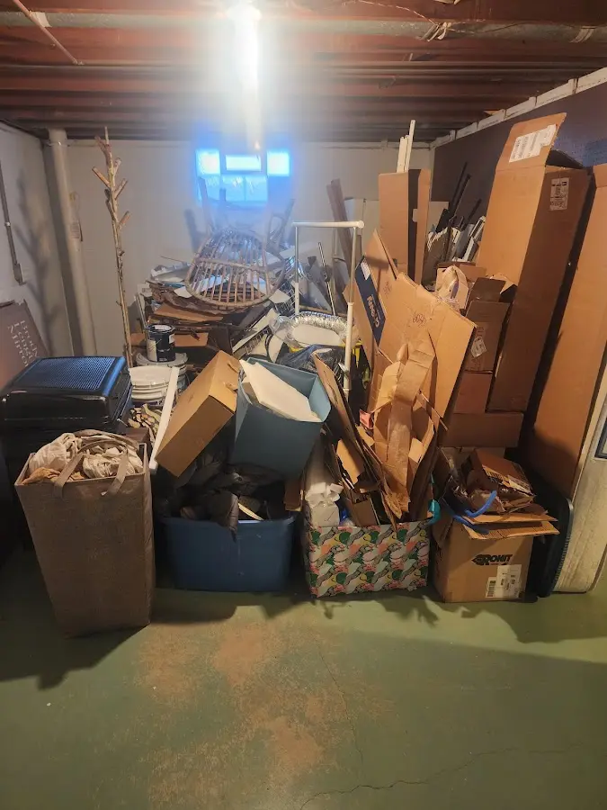 Roll-off dumpster container at job site for 2 Yard Dumpster Rental in Rochester